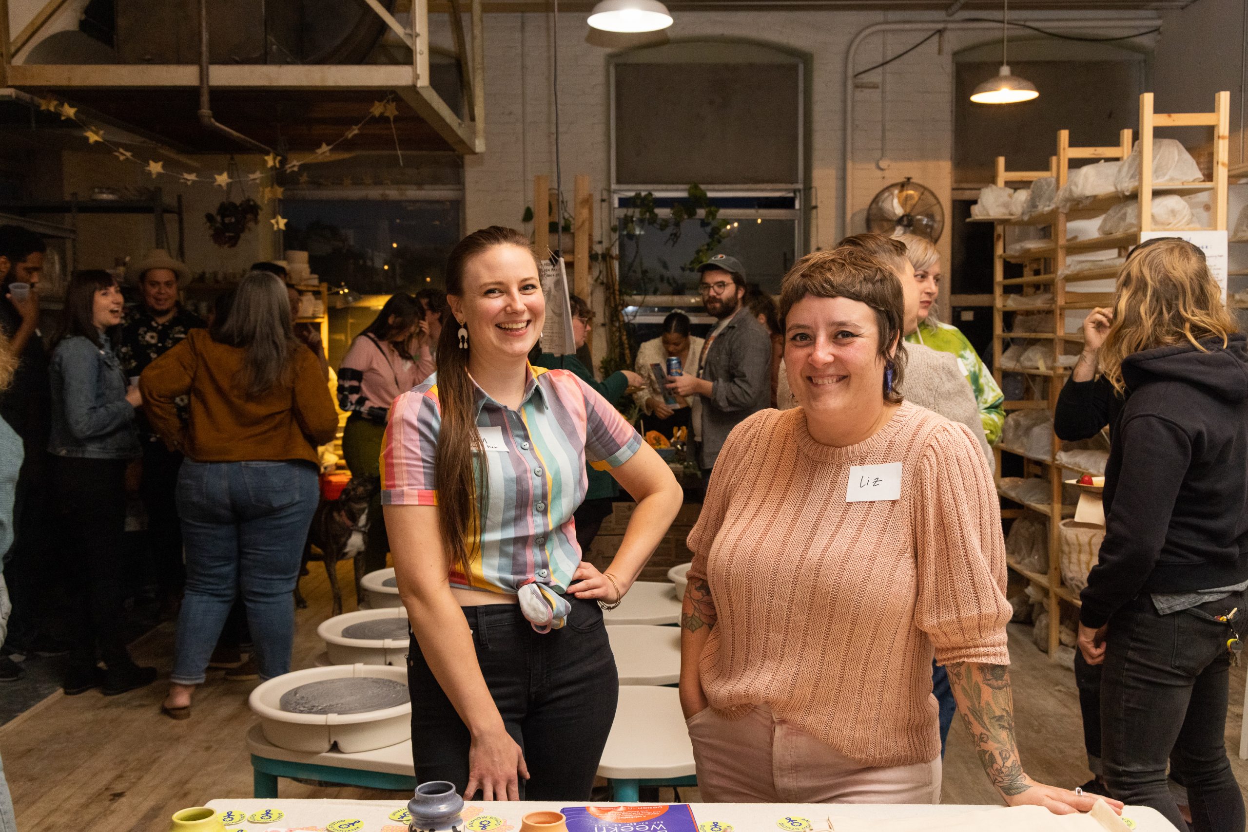 Anyhow Studio, a community pottery studio and the owner smiling.